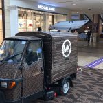 mobile coffee van set up for a promotional event inside a shopping centre