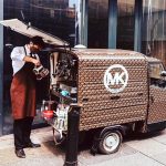 mobile coffee barista prepares a tasty coffee for customers