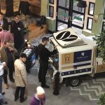 Branded mobile coffee van attracting customers at event