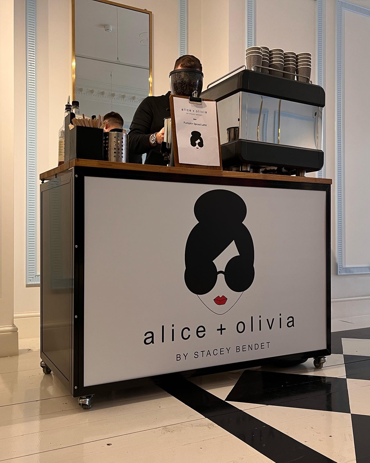Photos of one of our branded mobile coffee bars in store for Alice + Olivia