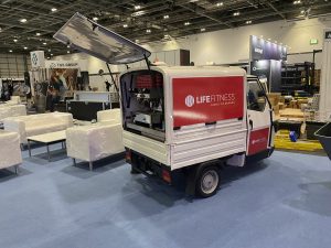 The Mobile Coffee Bean photos of a Life Fitness branded coffee van at an exhibition
