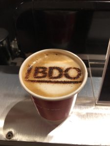 The Mobile Coffee Bean BDO logo branded coffee art