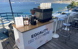 the-mobile-coffee-bean-branded-bar-for-outdoor-events branded mobile coffee bar in the sun at an outdoor event