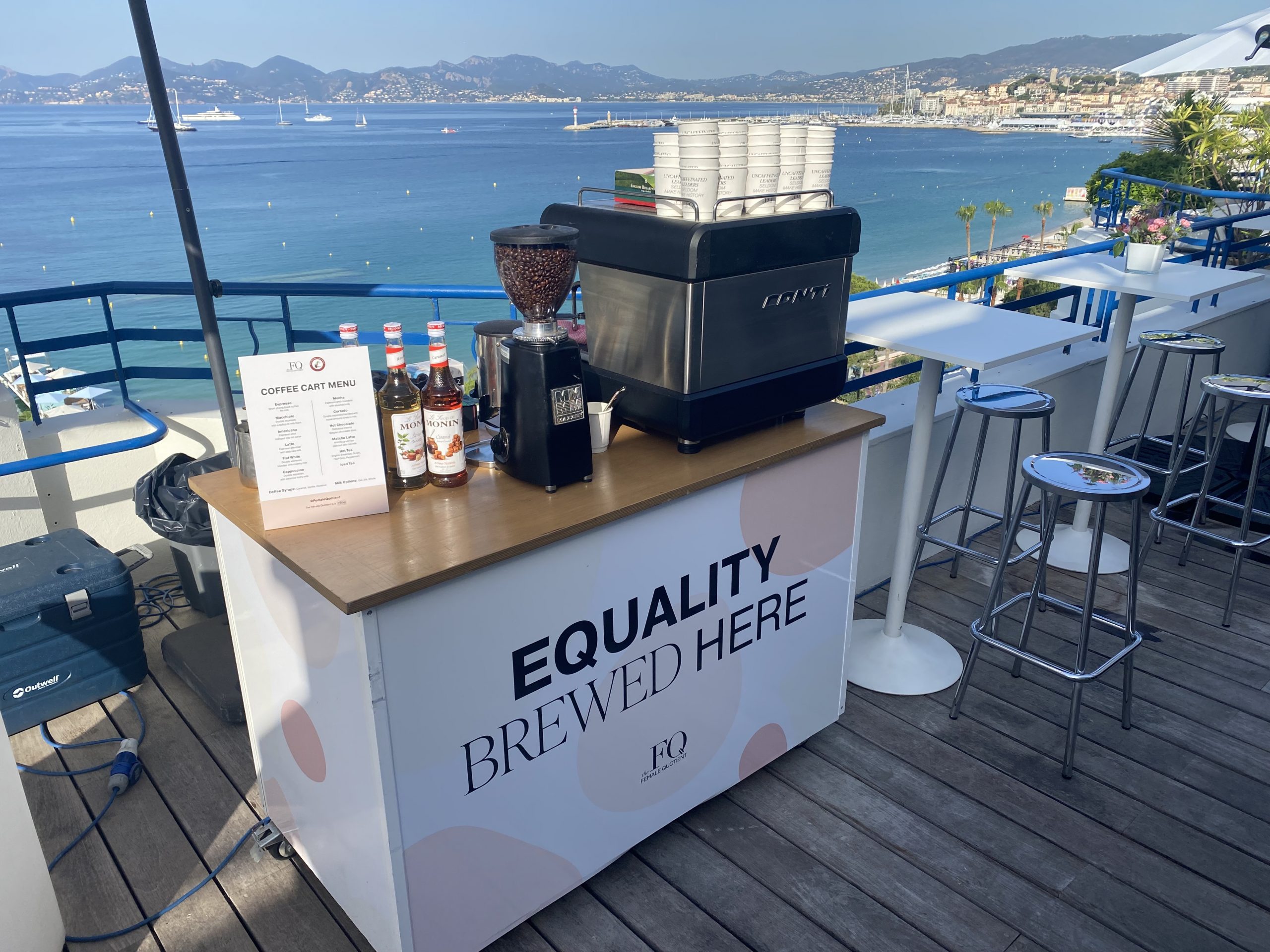 branded mobile coffee bar in the sun at an outdoor event