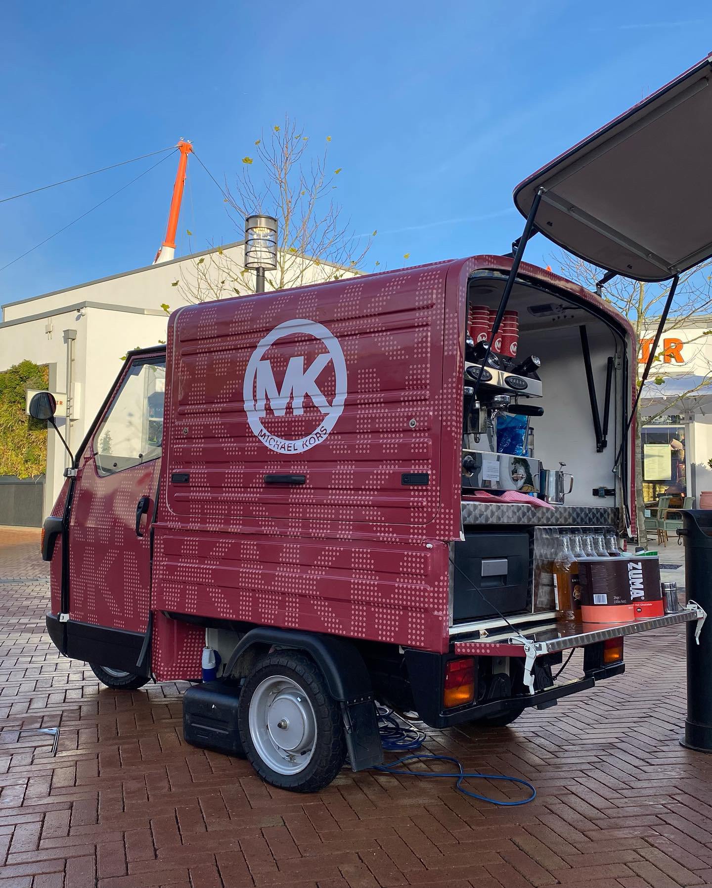 The Mobile Coffee Bean MK Michael Kors branded vinyl wrap van