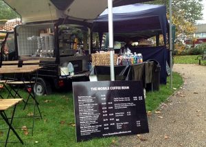 The Mobile Coffee Bean mobile coffee van hire with menu outdoors